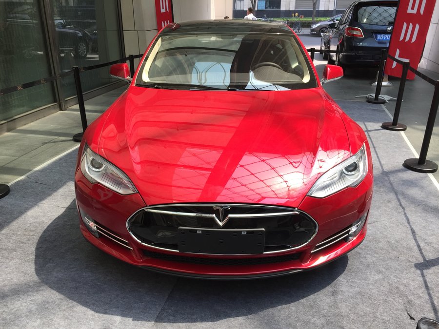 Tear Around Beijing in a Tesla: Ritz-Carlton Financial Street Offers ...