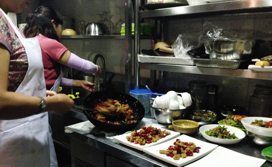 Black Sesame Kitchen Back Behind the Stove at The Orchid